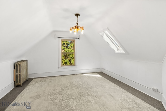606 S Washington St, Dillon, MT 59725 - additional living space with radiator, a skylight, lofted ceiling, a chandelier, and carpet flooring