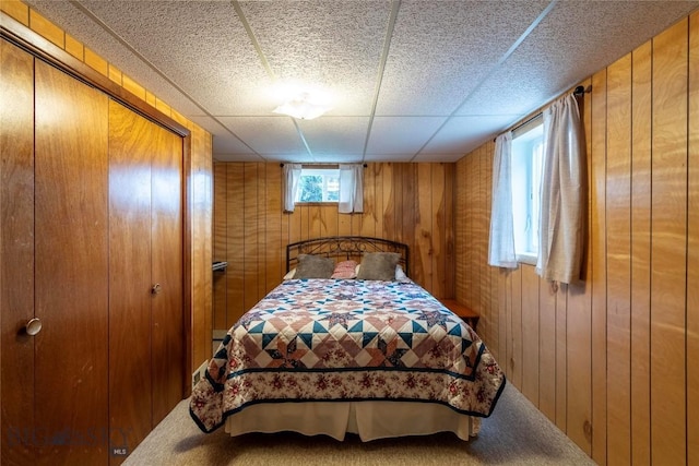 201 W 8th Ave, Big Timber, MT 59011 - bedroom with wood walls and carpet floors