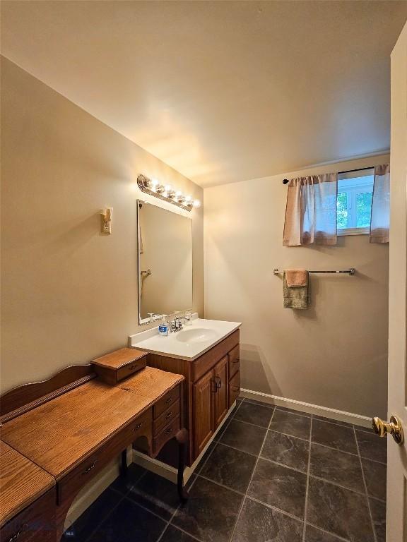 201 W 8th Ave, Big Timber, MT 59011 - bathroom with vanity and tile patterned floors