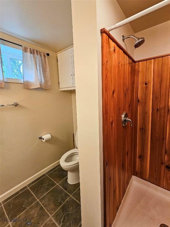201 W 8th Ave, Big Timber, MT 59011 - bathroom featuring a shower and tile patterned flooring