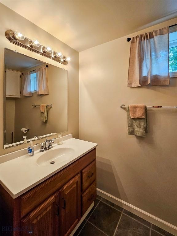 201 W 8th Ave, Big Timber, MT 59011 - bathroom featuring vanity and tile patterned flooring