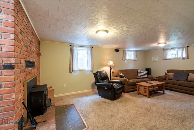 201 W 8th Ave, Big Timber, MT 59011 - living room with carpet floors and a wood stove