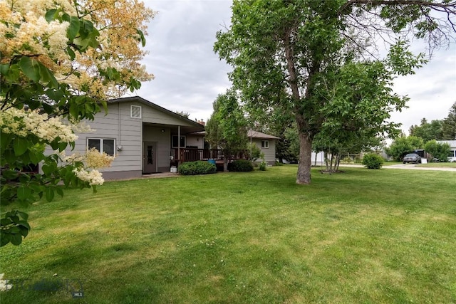 201 W 8th Ave, Big Timber, MT 59011 - view of grassy yard featuring a deck