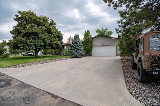 201 W 8th Ave, Big Timber, MT 59011 - view of property hidden behind natural elements with a garage, a front yard, and concrete driveway