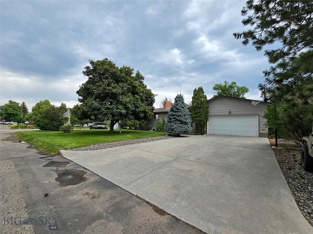 201 W 8th Ave, Big Timber, MT 59011 - view of front facade featuring a garage, a front yard, and driveway