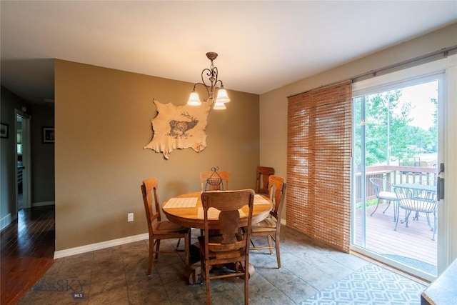 201 W 8th Ave, Big Timber, MT 59011 - dining area with baseboards and a chandelier