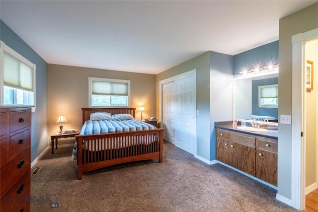 201 W 8th Ave, Big Timber, MT 59011 - bedroom with multiple windows, carpet floors, and a closet