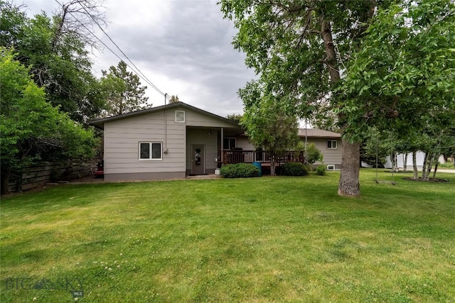 201 W 8th Ave, Big Timber, MT 59011 - view of front of home featuring a front lawn and a deck