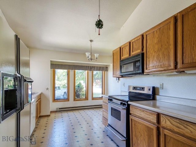 353 Sacajawea Peak Dr, Bozeman, MT 59718 - kitchen with white appliances, a baseboard heating unit, brown cabinetry, light countertops, and a chandelier