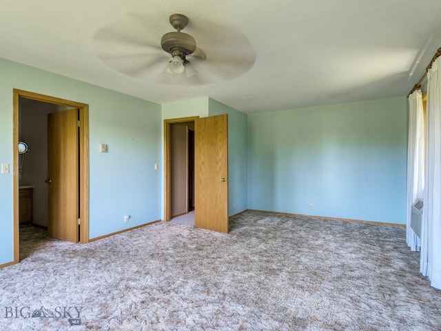 353 Sacajawea Peak Dr, Bozeman, MT 59718 - unfurnished bedroom with carpet floors and a ceiling fan