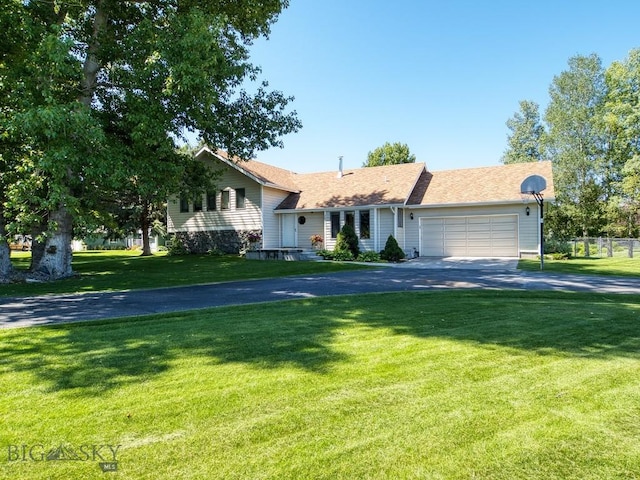 353 Sacajawea Peak Dr, Bozeman, MT 59718 - view of front of property with asphalt driveway and a garage