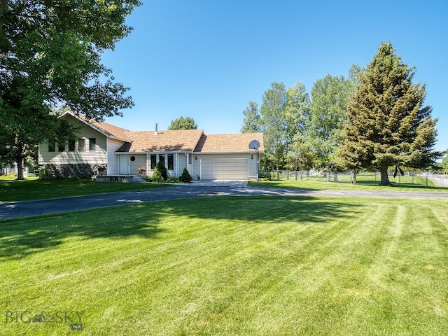 353 Sacajawea Peak Dr, Bozeman, MT 59718 - view of front of home with asphalt driveway and a garage