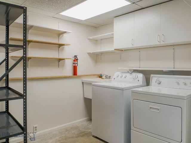 353 Sacajawea Peak Dr, Bozeman, MT 59718 - laundry room with cabinet space and washer and dryer