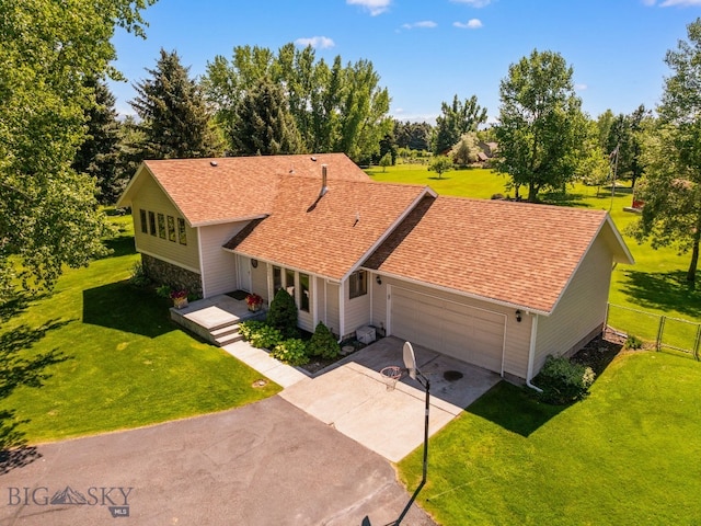 353 Sacajawea Peak Dr, Bozeman, MT 59718 - view of front of property featuring a garage, driveway, and roof with shingles