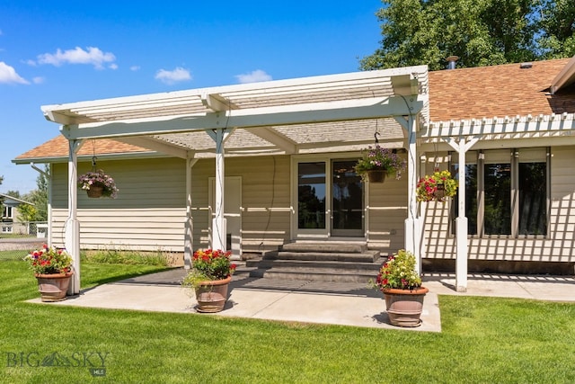 353 Sacajawea Peak Dr, Bozeman, MT 59718 - rear view of house featuring entry steps, a pergola, a yard, and a shingled roof
