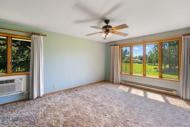 353 Sacajawea Peak Dr, Bozeman, MT 59718 - empty room featuring a baseboard radiator, carpet floors, a ceiling fan, and a wall unit AC