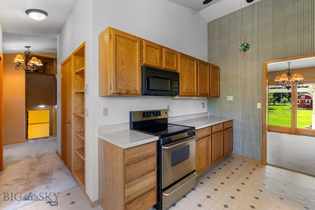 353 Sacajawea Peak Dr, Bozeman, MT 59718 - kitchen with black microwave, electric range, a chandelier, a high ceiling, and light countertops