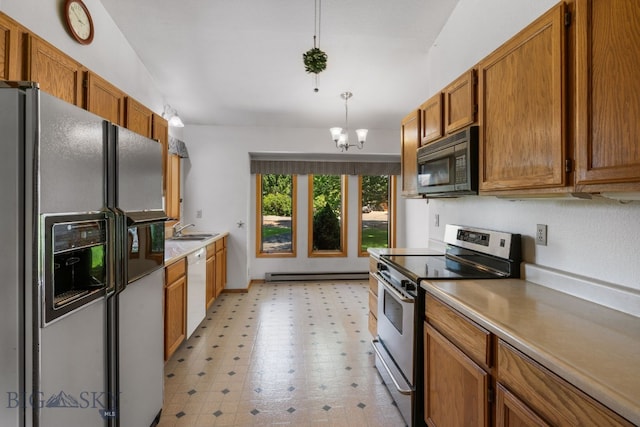 353 Sacajawea Peak Dr, Bozeman, MT 59718 - kitchen featuring refrigerator with ice dispenser, stainless steel electric range, black microwave, a baseboard heating unit, and light floors