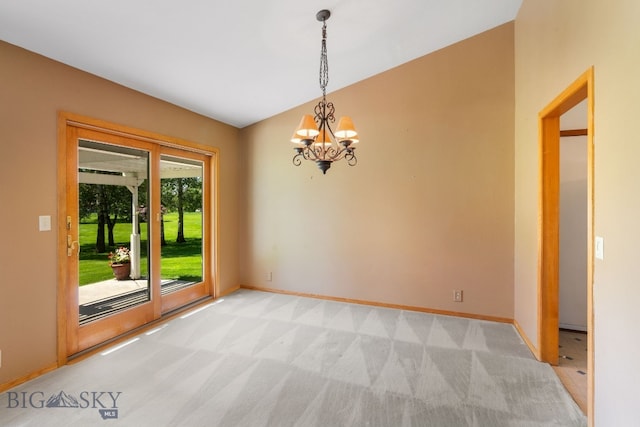 353 Sacajawea Peak Dr, Bozeman, MT 59718 - empty room with a chandelier, light colored carpet, and vaulted ceiling
