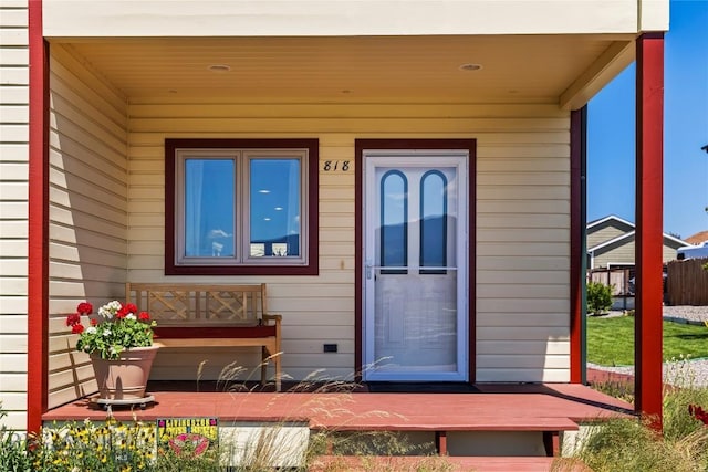 818 N 13th St, Livingston, MT 59047 - doorway to property featuring covered porch