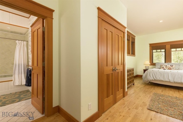 526 Chief Joseph, Big Sky, MT 59716 - bedroom with light wood-type flooring and baseboards