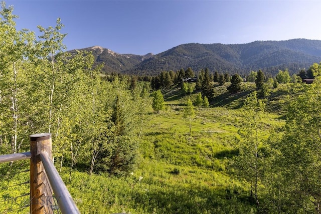 526 Chief Joseph, Big Sky, MT 59716 - mountain view featuring a heavily wooded area