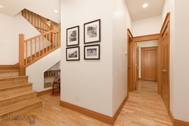 526 Chief Joseph, Big Sky, MT 59716 - corridor featuring light wood finished floors, stairway, and recessed lighting