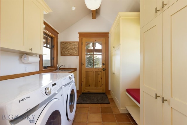 526 Chief Joseph, Big Sky, MT 59716 - laundry area featuring cabinet space and washing machine and clothes dryer