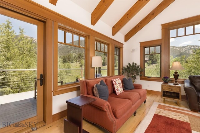 526 Chief Joseph, Big Sky, MT 59716 - sunroom with plenty of natural light and a mountain view