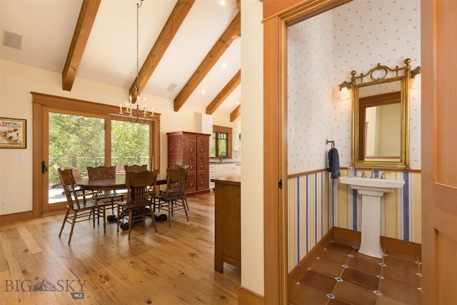 526 Chief Joseph, Big Sky, MT 59716 - dining room featuring a chandelier and wood finished floors
