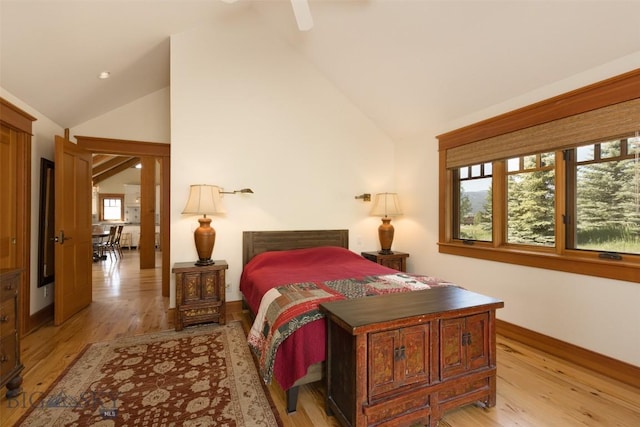 526 Chief Joseph, Big Sky, MT 59716 - bedroom with light wood-style floors, high vaulted ceiling, and ceiling fan