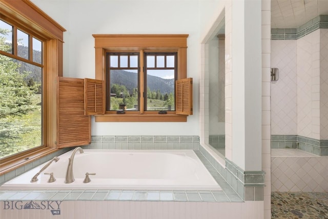 526 Chief Joseph, Big Sky, MT 59716 - bathroom with a bath and a mountain view