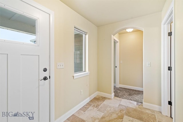 1705 Ingomar Blvd, Belgrade, MT 59714 - entryway featuring arched walkways and stone tile floors