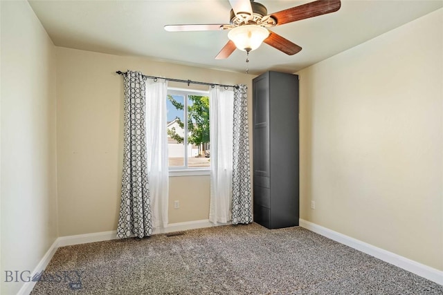 1705 Ingomar Blvd, Belgrade, MT 59714 - carpeted empty room featuring a ceiling fan and baseboards