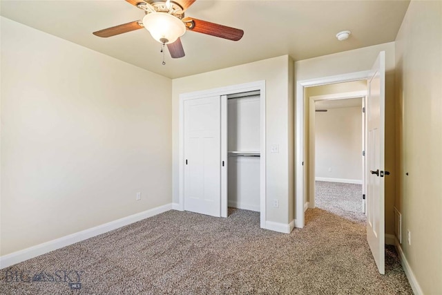 1705 Ingomar Blvd, Belgrade, MT 59714 - unfurnished bedroom featuring carpet floors, a closet, and ceiling fan