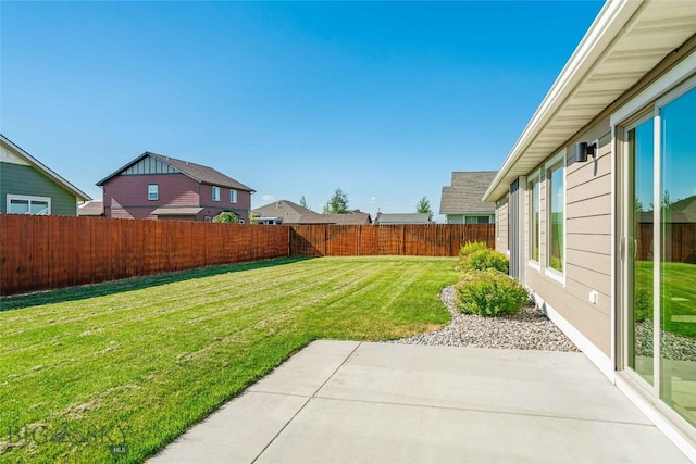 1705 Ingomar Blvd, Belgrade, MT 59714 - fenced backyard featuring a patio