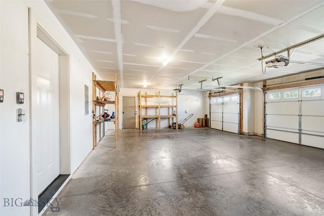 1705 Ingomar Blvd, Belgrade, MT 59714 - garage featuring electric panel and a garage door opener