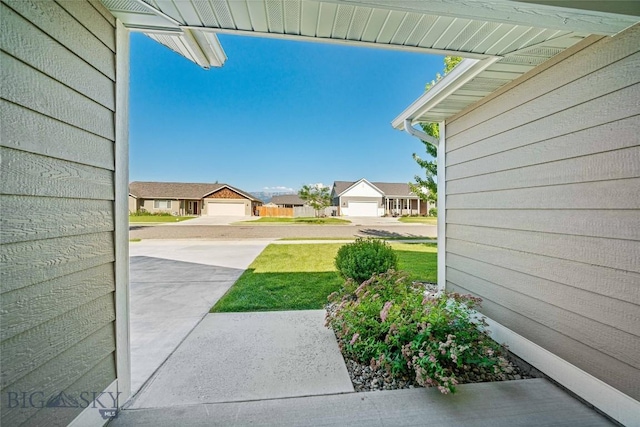 1705 Ingomar Blvd, Belgrade, MT 59714 - view of grassy yard featuring a residential view