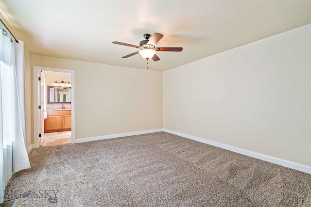 1705 Ingomar Blvd, Belgrade, MT 59714 - unfurnished room featuring light carpet and ceiling fan