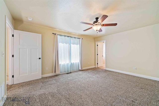1705 Ingomar Blvd, Belgrade, MT 59714 - unfurnished bedroom with carpet and ceiling fan