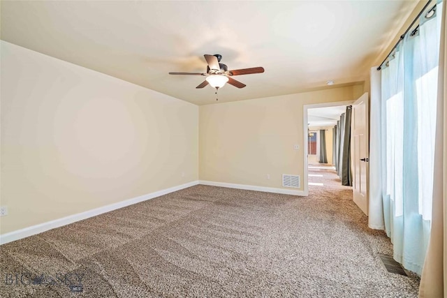 1705 Ingomar Blvd, Belgrade, MT 59714 - spare room with light colored carpet and ceiling fan