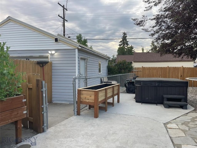 2625 St Ann St, Butte, MT 59701 - fenced backyard with a hot tub and a patio