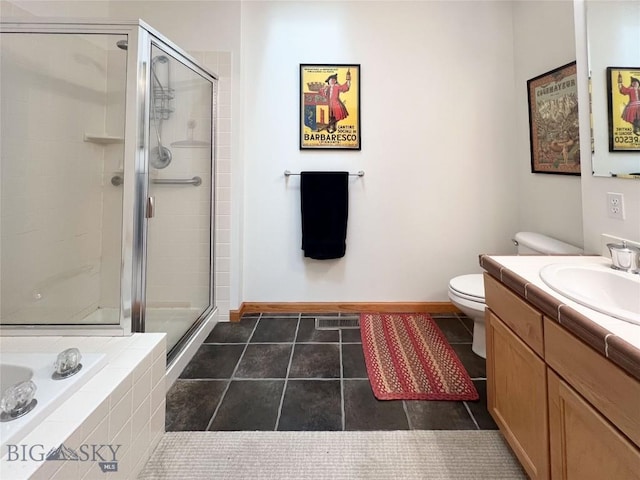 1031 Boylan, Bozeman, MT 59715 - bathroom featuring a stall shower, vanity, a garden tub, and tile patterned flooring