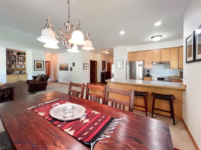 1031 Boylan, Bozeman, MT 59715 - dining room featuring a chandelier, recessed lighting, and built in features