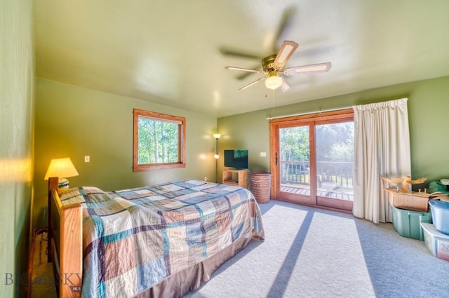 8799 Huffman Ln, Bozeman, MT 59715 - carpeted bedroom featuring access to outside and ceiling fan