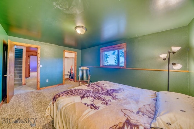 8799 Huffman Ln, Bozeman, MT 59715 - carpeted bedroom with a walk in closet
