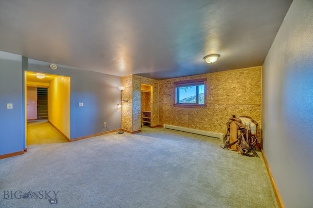8799 Huffman Ln, Bozeman, MT 59715 - unfurnished living room with baseboard heating and carpet flooring
