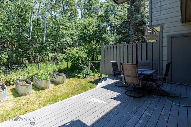 2020 S Rouse Unit 7, Bozeman, MT 59715 - wooden terrace featuring outdoor dining space