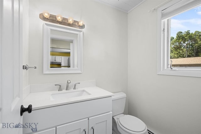 2020 S Rouse Unit 7, Bozeman, MT 59715 - half bathroom featuring vanity and ornamental molding