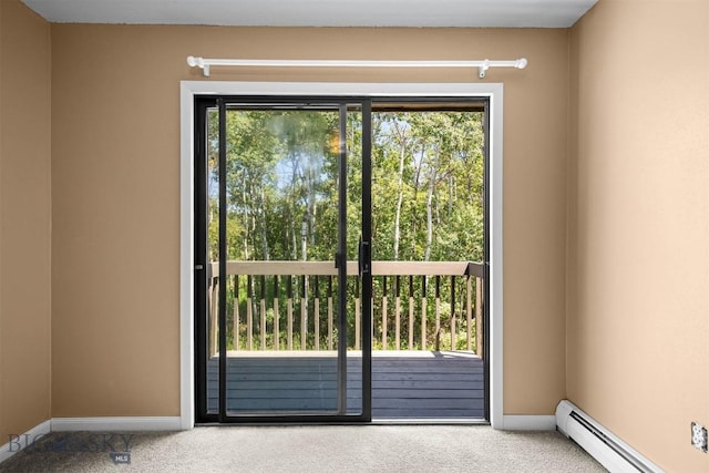 2020 S Rouse Unit 7, Bozeman, MT 59715 - entryway featuring a baseboard heating unit and carpet floors